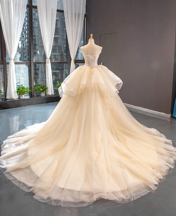 High-end Champagne Bridal Wedding Dresses 2023 Ball Gown Strapless Sleeveless Backless Appliques Lace Cathedral Train Ruffle