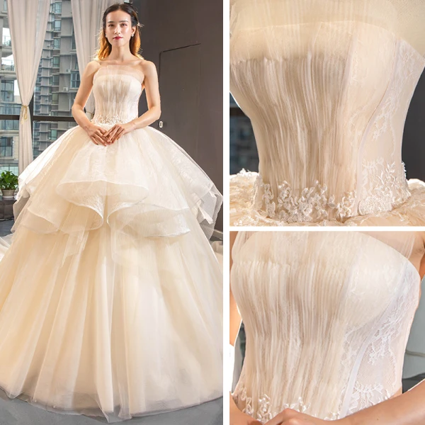 High-end Champagne Bridal Wedding Dresses 2023 Ball Gown Strapless Sleeveless Backless Appliques Lace Cathedral Train Ruffle