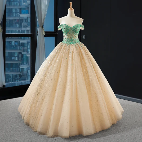 Haut de Gamme Champagne La Mariée Robe De Mariée 2023 Trompette / Sirène Encolure Dégagée Manches Longues Dos Nu Glitter Tulle Tribunal Train Volants