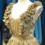 Scintillantes Doré Paillettes Robe De Soirée 2023 Princesse V-Cou Sans Manches Tribunal Train Volants Dos Nu Robe De Ceremonie