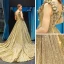 Scintillantes Doré Paillettes Robe De Soirée 2023 Princesse V-Cou Sans Manches Tribunal Train Volants Dos Nu Robe De Ceremonie