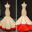 Deux tons Champagne Rouge Satin Tapis rouge Robe De Soirée 2023 Trompette / Sirène V-Cou Sans Manches Train De Balayage Volants Dos Nu Robe De Ceremonie