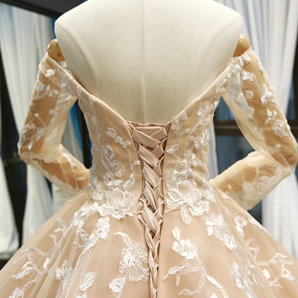 High-end Champagne Bridal Wedding Dresses 2023 Ball Gown Off-The-Shoulder Long Sleeve Backless Flower Appliques Lace Court Train Ruffle