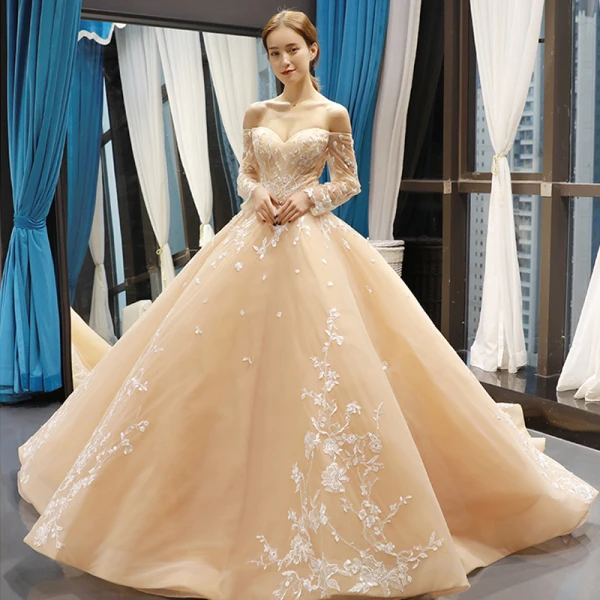 High-end Champagne Bridal Wedding Dresses 2023 Ball Gown Off-The-Shoulder Long Sleeve Backless Flower Appliques Lace Court Train Ruffle