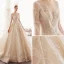Betoverend Champagne Doorzichtige Trouwjurken 2019 Prinses Ronde Hals Lange Mouwen Handgemaakt Kralen Glans Tule Cathedral Train