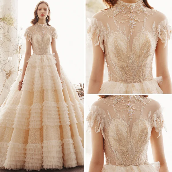Vintage Champagner Durchsichtige Spitze Brautkleider / Hochzeitskleider 2019 Prinzessin Stehkragen Ärmellos Rückenfreies Perlenstickerei Königliche Schleppe Rüschen