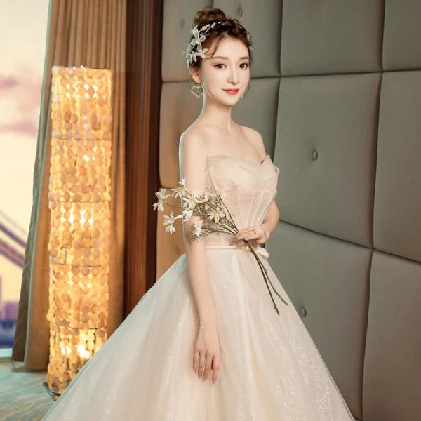 Bling Bling Champagne Brudekjoler 2019 Prinsesse Kjæreste Uten Ermer Ryggløse Sløyfe Sash Beading Glitter Polyester Cathedral Train Buste