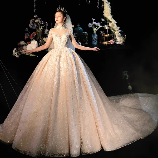 Fabulous Champagne See-through Wedding Dresses 2019 Ball Gown High Neck 3/4 Sleeve Backless Appliques Lace Beading Glitter Tulle Cathedral Train Ruffle