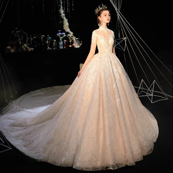 Fabuleux Champagne Transparentes Robe De Mariée 2019 Robe Boule Col Haut 3/4 Manches Dos Nu Appliques En Dentelle Perlage Glitter Tulle Cathedral Train Volants