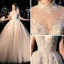 Fabuleux Champagne Transparentes Robe De Mariée 2019 Robe Boule Col Haut 3/4 Manches Dos Nu Appliques En Dentelle Perlage Glitter Tulle Cathedral Train Volants