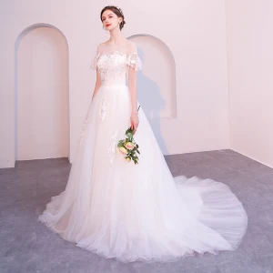 Abordable Ivoire Transparentes Robe De Mariée 2019 Princesse Encolure Dégagée Manches Courtes Dos Nu Appliques En Dentelle Tribunal Train
