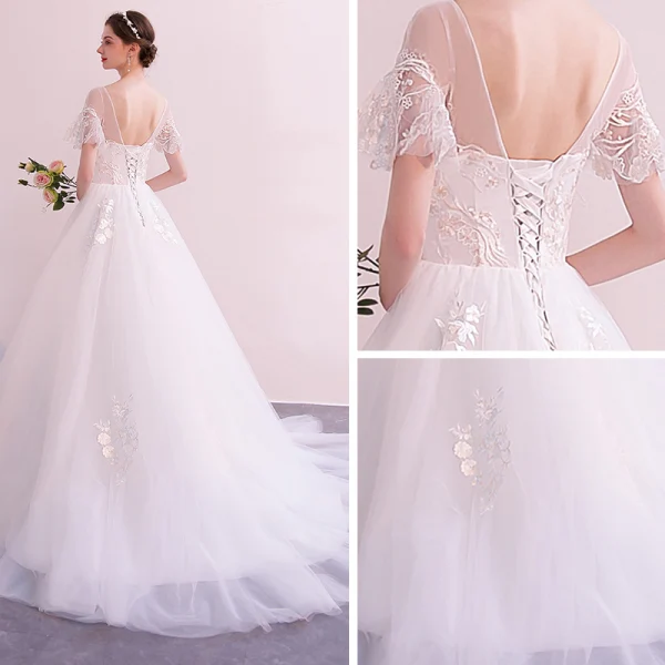 Abordable Ivoire Transparentes Robe De Mariée 2019 Princesse Encolure Dégagée Manches Courtes Dos Nu Appliques En Dentelle Tribunal Train