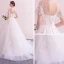 Abordable Ivoire Transparentes Robe De Mariée 2019 Princesse Encolure Dégagée Manches Courtes Dos Nu Appliques En Dentelle Tribunal Train