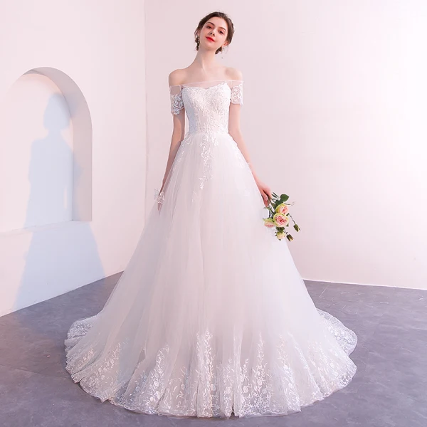 Abordable Ivoire Transparentes Robe De Mariée 2019 Princesse De l'épaule Manches Courtes Dos Nu Appliques En Dentelle Tribunal Train Volants
