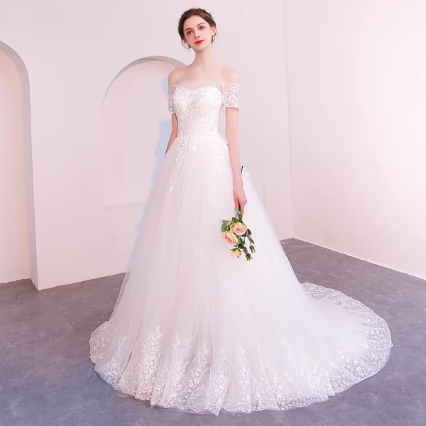 Abordable Ivoire Transparentes Robe De Mariée 2019 Princesse De l'épaule Manches Courtes Dos Nu Appliques En Dentelle Tribunal Train Volants