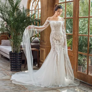 Élégant Ivoire Plage Robe De Mariée 2023 Trompette Sirène De L Épaule Manches Longues Dos Nu Appliques En Dentelle Tribunal Train Volants