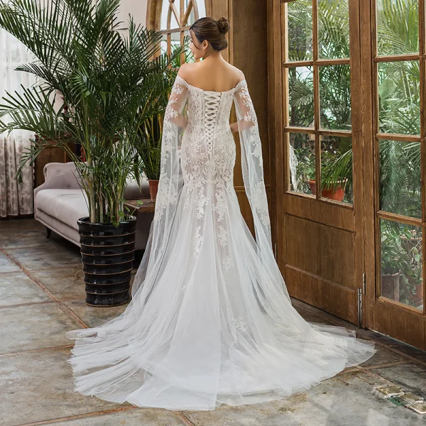 Elegant Ivory Beach Wedding Dresses 2023 Trumpet / Mermaid Off-The-Shoulder Long Sleeve Backless Appliques Lace Court Train Ruffle