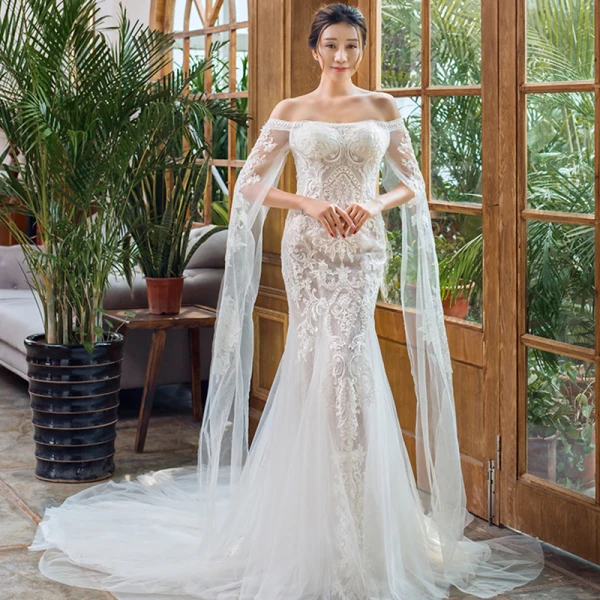 Elegant Ivory Beach Wedding Dresses 2023 Trumpet Mermaid Off-The-Shoulder Long Sleeve Elegant Ivory Beach Wedding Dresses 2023 Trumpet Mermaid Off-The-Shoulder Long Sleeve