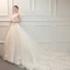 Élégant Ivoire Robe De Mariée 2019 Princesse V-Cou Sans Manches Dos Nu Appliques En Dentelle Perlage Glitter Tulle Volants Chapel Train