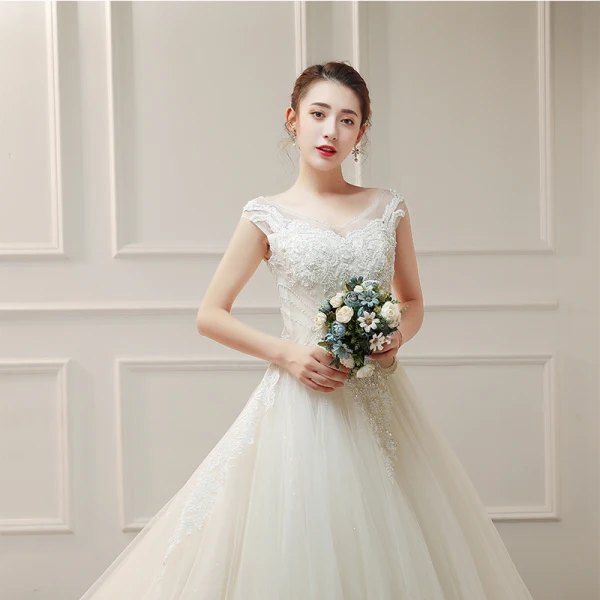 Élégant Ivoire Robe De Mariée 2019 Princesse V-Cou Sans Manches Dos Nu Appliques En Dentelle Perlage Glitter Tulle Volants Chapel Train