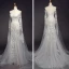 Elegant Ivory Beach Wedding Dresses 2023 Trumpet / Mermaid Off-The-Shoulder Long Sleeve Backless Appliques Lace Court Train Ruffle