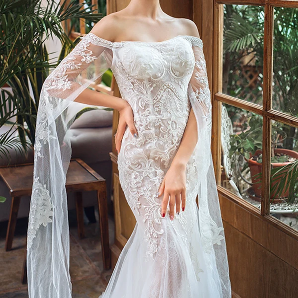 Elegant Ivory Beach Wedding Dresses 2023 Trumpet / Mermaid Off-The-Shoulder Long Sleeve Backless Appliques Lace Court Train Ruffle