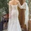 Elegant Ivory Beach Wedding Dresses 2023 Trumpet / Mermaid Off-The-Shoulder Long Sleeve Backless Appliques Lace Court Train Ruffle