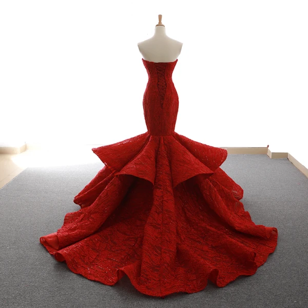 Luxe Bordeaux Tapis rouge Robe De Soirée 2023 Trompette / Sirène Bustier Sans Manches Glitter Appliques En Dentelle Train De Balayage Volants Dos Nu Robe De Ceremonie