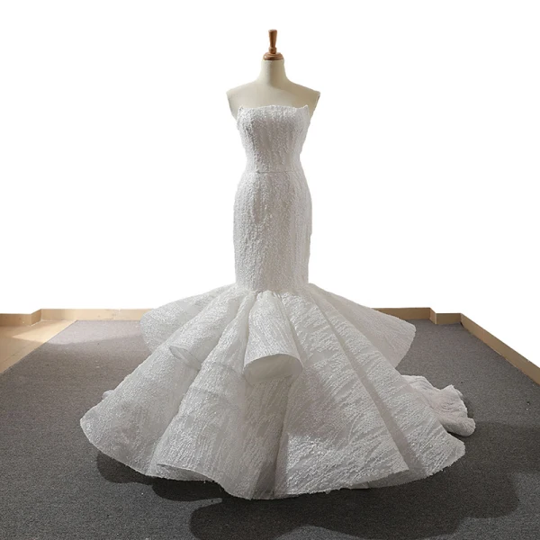 Luxe Bordeaux Tapis rouge Robe De Soirée 2023 Trompette / Sirène Bustier Sans Manches Glitter Appliques En Dentelle Train De Balayage Volants Dos Nu Robe De Ceremonie