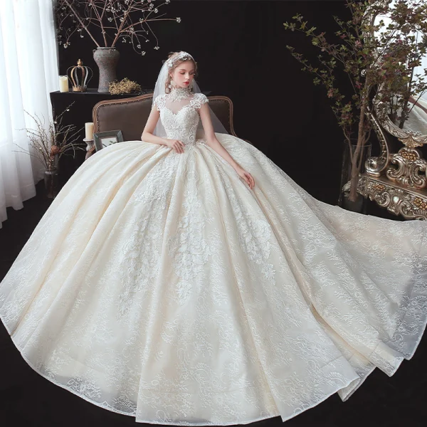 Vintage / Retro Champagne See-through Bridal Wedding Dresses 2020 Ball Gown High Neck Sleeveless Appliques Lace Beading Pearl Chapel Train Ruffle