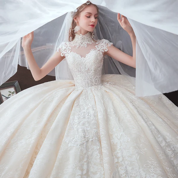 Vintage / Retro Champagne See-through Bridal Wedding Dresses 2020 Ball Gown High Neck Sleeveless Appliques Lace Beading Pearl Chapel Train Ruffle