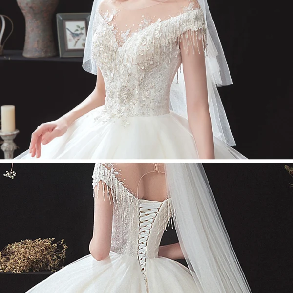 Romantisch Ivory / Creme Hochzeits Brautkleider / Hochzeitskleider 2020 Ballkleid Durchsichtige Rundhalsausschnitt Kurze Ärmel Rückenfreies Applikationen Spitze Perlenstickerei Quaste Kathedrale Schleppe Fallende Rüsche
