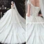 Romantisch Ivory / Creme Hochzeits Brautkleider / Hochzeitskleider 2020 Ballkleid Durchsichtige Rundhalsausschnitt Kurze Ärmel Rückenfreies Applikationen Spitze Perlenstickerei Quaste Kathedrale Schleppe Fallende Rüsche