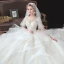 Style Victorien Ivoire Transparentes La Mariée Robe De Mariée 2020 V-Cou Robe Boule Gonflée 1/2 Manches Dos Nu Appliques En Dentelle Perlage Cathedral Train Volants