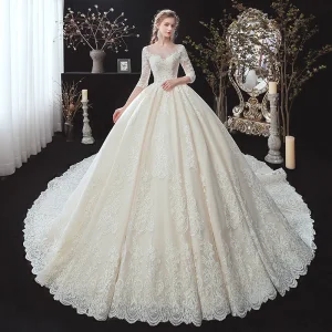 Classic Champagne See Through Bridal Wedding Dresses 2020 Ball Gown Scoop Neck 3 4 Sleeve Backless Appliques Lace Beading Cathedral Train Ruffle