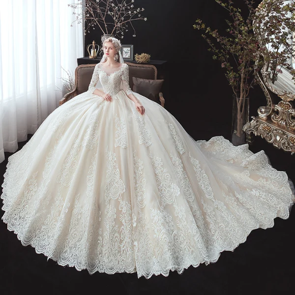 Classic Champagne See-through Bridal Wedding Dresses 2020 Ball Gown Scoop Neck 3/4 Sleeve Backless Appliques Lace Beading Cathedral Train Ruffle
