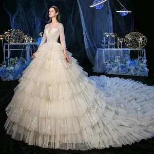 Fabelachtig Champagne Glans Ster Trouwjurken 2020 A Lijn Doorzichtige Ronde Hals 3 4 Mouwen Ruglooze Kralen Royal Train Cascading Ruches
