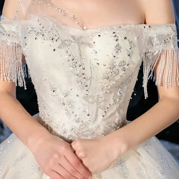 Chic / Beautiful Champagne Bridal Wedding Dresses 2020 A-Line / Princess Off-The-Shoulder Short Sleeve Backless Glitter Tulle Beading Tassel Royal Train Ruffle