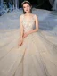 Romantique Champagne Glitter Étoile Tulle Robe De Mariée Avec Châle 2020 Robe Boule Transparentes Col v profond Sans Manches Dos Nu Appliques En Dentelle Perlage Cathedral Train Volants