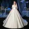Modest / Simple Ivory Satin Bridal Wedding Dresses 2020 Ball Gown Off-The-Shoulder Short Sleeve Backless Chapel Train Ruffle