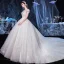 Illusion Ivoire Transparentes La Mariée Robe De Mariée 2020 Princesse Encolure Dégagée Manches Courtes Dos Nu Glitter Tulle Appliques Fleur Perlage Cathedral Train Volants