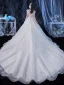 Illusion Ivoire Transparentes La Mariée Robe De Mariée 2020 Princesse Encolure Dégagée Manches Courtes Dos Nu Glitter Tulle Appliques Fleur Perlage Cathedral Train Volants