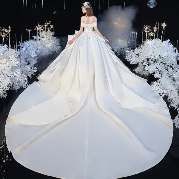 Modest / Simple Ivory Satin Bridal Wedding Dresses 2020 Ball Gown Off-The-Shoulder Short Sleeve Backless Cathedral Train Ruffle