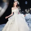 Modest / Simple Ivory Satin Bridal Wedding Dresses 2020 Ball Gown Off-The-Shoulder Short Sleeve Backless Cathedral Train Ruffle