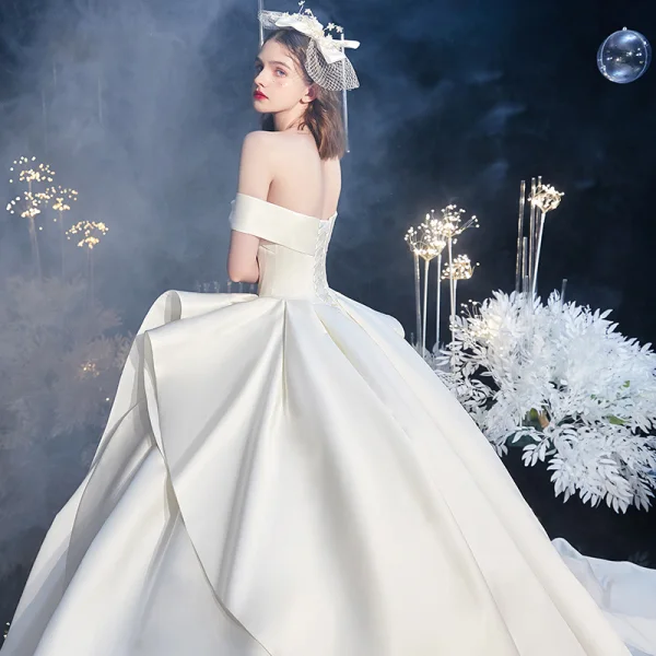 Modest / Simple Ivory Satin Bridal Wedding Dresses 2020 Ball Gown Off-The-Shoulder Short Sleeve Backless Cathedral Train Ruffle