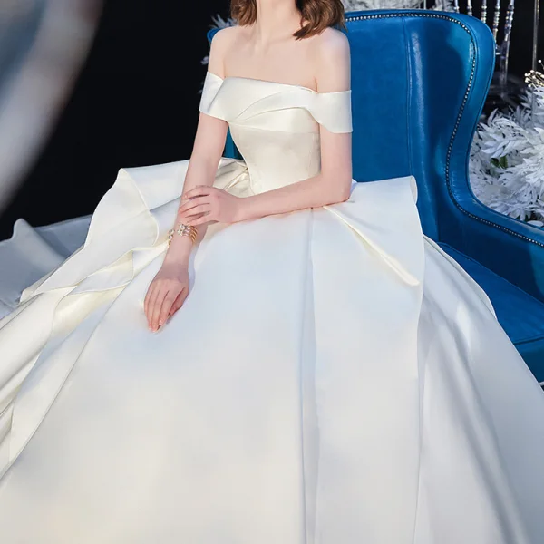 Modest / Simple Ivory Satin Bridal Wedding Dresses 2020 Ball Gown Off-The-Shoulder Short Sleeve Backless Cathedral Train Ruffle