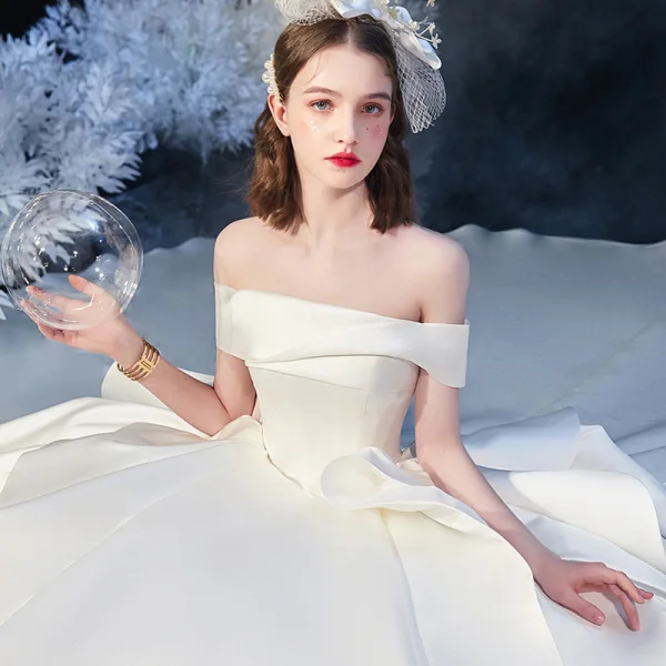 Modest / Simple Ivory Satin Bridal Wedding Dresses 2020 Ball Gown Off-The-Shoulder Short Sleeve Backless Cathedral Train Ruffle