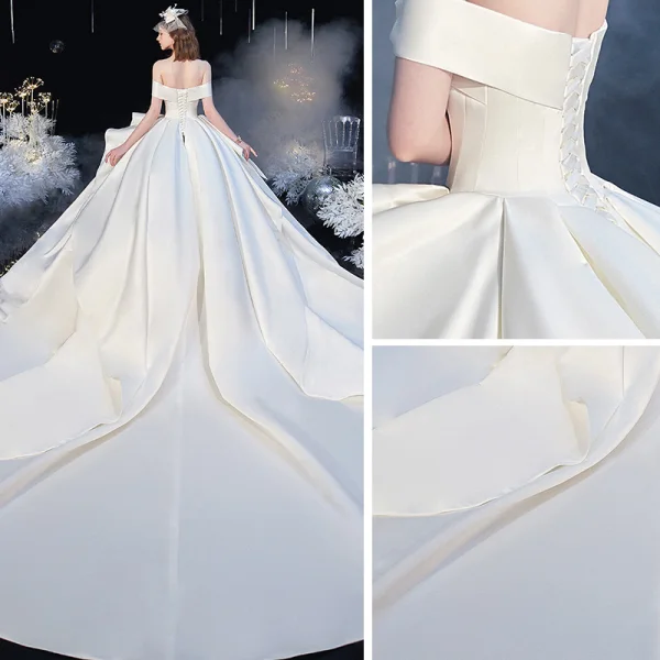 Modest / Simple Ivory Satin Bridal Wedding Dresses 2020 Ball Gown Off-The-Shoulder Short Sleeve Backless Cathedral Train Ruffle