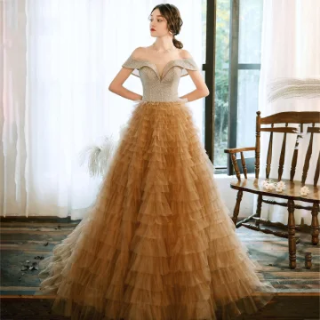 Charming Champagne Evening Dresses 2020 A Line Princess Off The Shoulder Short Sleeve Glitter Tulle Floor Length Long Cascading Ruffles Backless Formal Dresses