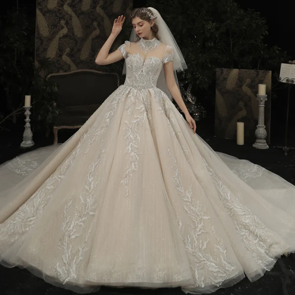 Luxury / Gorgeous Champagne See-through Bridal Wedding Dresses 2020 Ball Gown High Neck Short Sleeve Backless Appliques Lace Handmade  Beading Glitter Tulle Cathedral Train